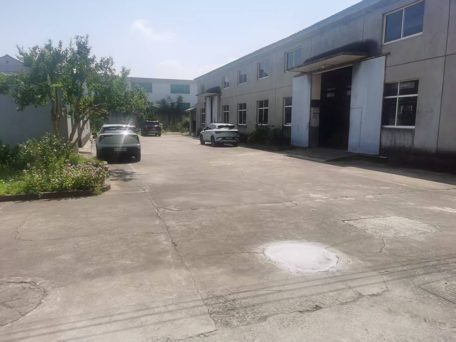 Real exterior view of the RT-Plasparts factory site